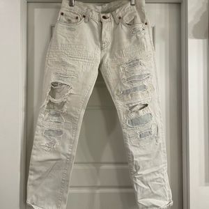 NSF, cream ripped jeans.